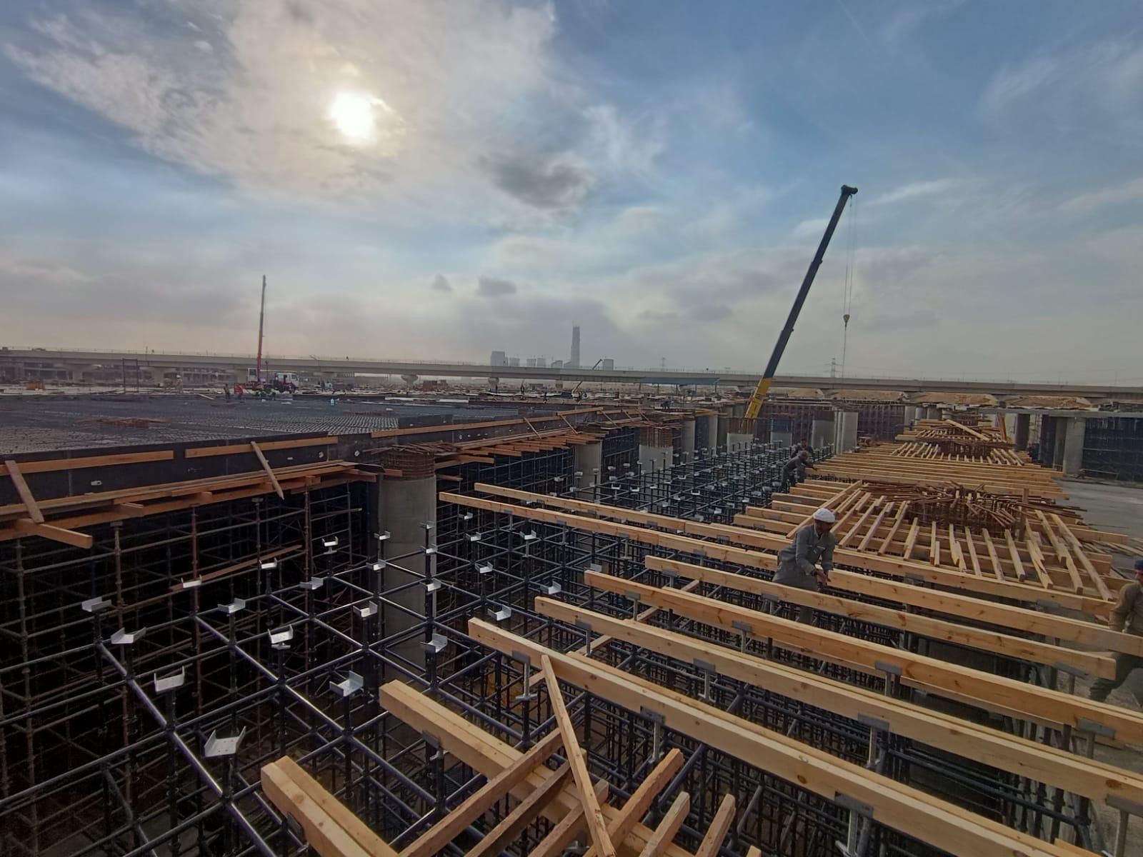 Wooden boards or plywood on top, which are used as surfaces for pouring concrete over.